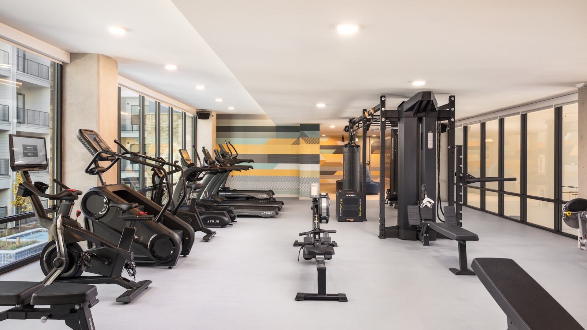 fitness center with exercise equipment