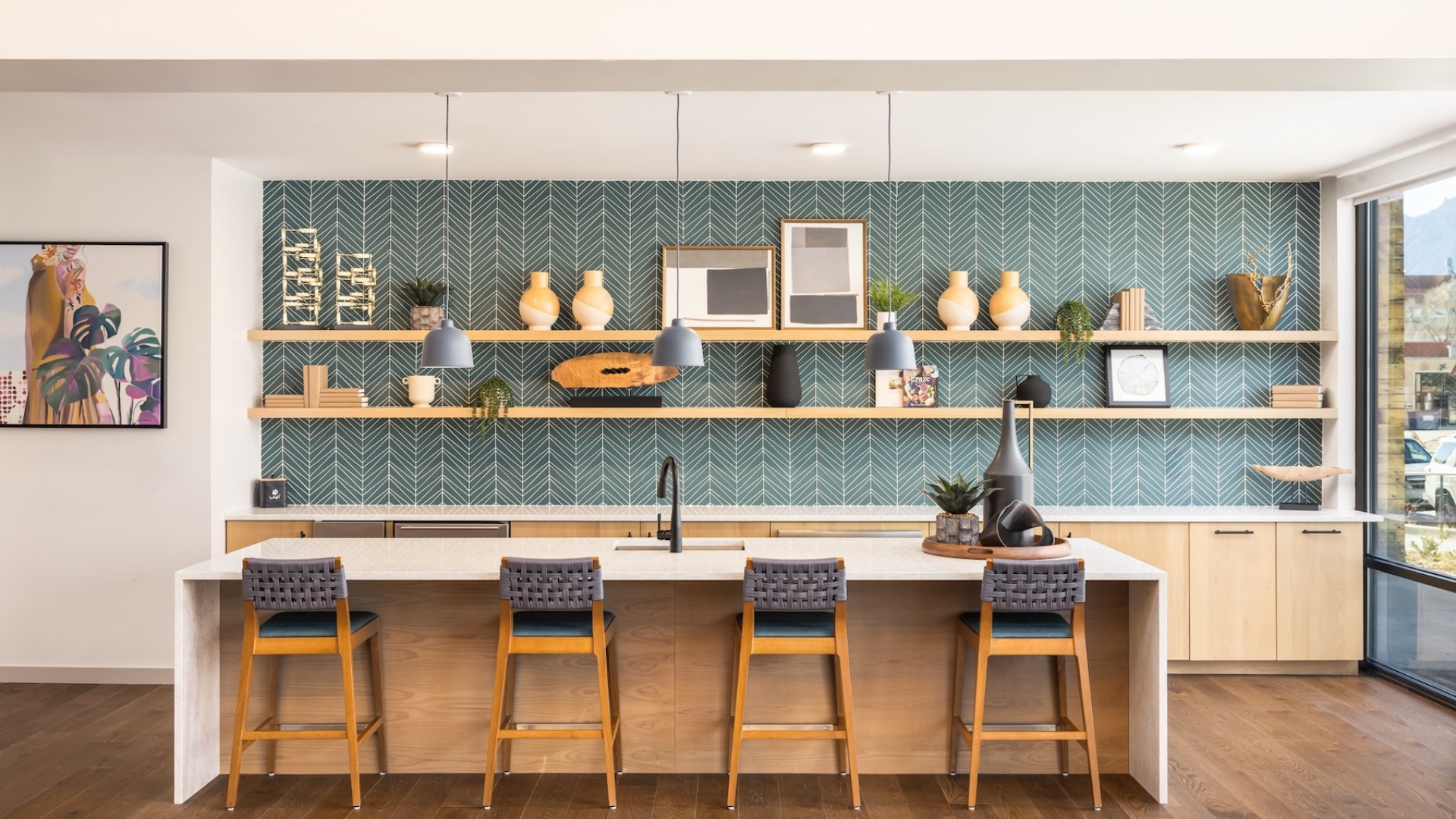 community kitchen area with a large island and bar stools